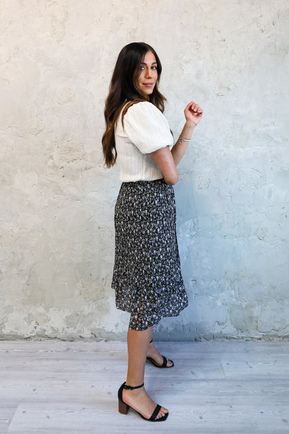 PLEATED MIDI SKIRT IN GRAPEVINE